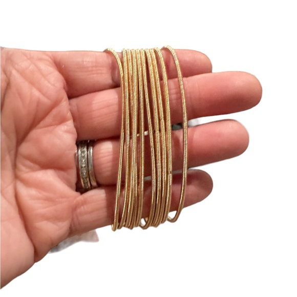 Set of Gold Stretchy Spring Bracelets - Picture 2 of 3